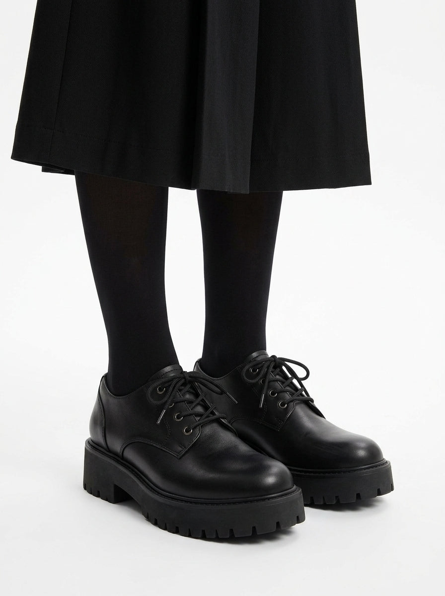Wednesday Addams Costume - boots and tights close-up