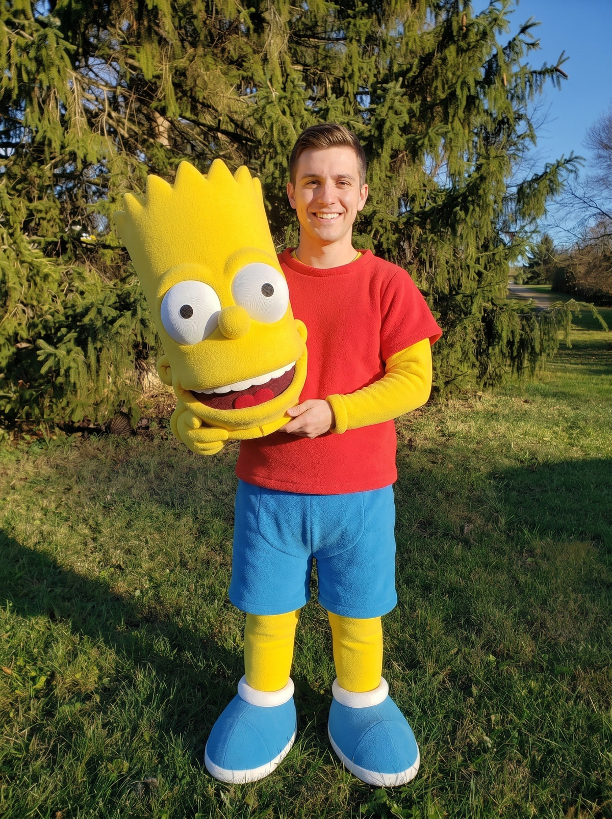 Man holding mascot head