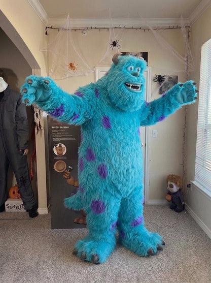 Blue monster mascot posing